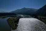 FILE - Water spills over the Bonneville Dam on the Columbia River, which runs along the Washington and Oregon state line, June 21, 2022. The U.S. and Canada said Thursday, July 11, 2024, that they have agreed to update a six-decade-old treaty that governs the use of one of North America’s largest rivers, the Columbia, with implications for electricity prices, irrigation, flood control and imperiled salmon runs.