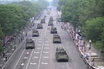 Armored vehicles drive during the Army 250th Anniversary Parade in Washington, DC on June 14, 2025.