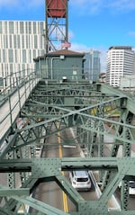 The view from the machinery level of the Hawthorne Bridge.  "During the summer when you come out here to check the cabling and stuff, it's really nice," said On-Call Bridge Operator Dave Hanemann. "People are on the river. It's warm. You can hear music and everything. Sometimes if you're here for the Blues Festival, you get a free concert. "