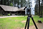 A laser scanner makes a three-dimensional map of Silver Falls Lodge.