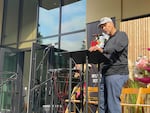 Carl Talton, a longtime community advocate who grew up in Northeast Portland, speaks before a gathering at the opening of the Albina One housing development on Saturday, Sept. 6.