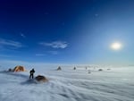 The wind blows across the landscape in Allan Hills, Antarctica in December 2022. In this location, layers of old ice have been pushed toward the surface by slow currents within the ice sheet, meaning older ice is relatively shallow and accessible tor researchers.