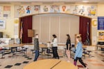 After they complete homework in the middle-school school cafeteria, students disperse into their various after-school clubs.