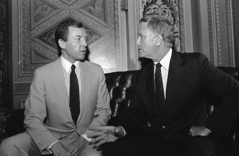 Sen. Orrin Hatch (R-Utah), left and Sen. Bob Packwood (R-Ore.), debate a proposed constitutional amendment to ban abortion, June 27, 1983 in Washington in the president's room off the Senate floor. Sen. Hatch, sponsor of the amendment, conceded that he doesn't have the votes to win passage of the constitutional amendment. (AP Photo/Scott Applewhite)