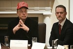 Elon Musk and U.S. Trade Representative Jamieson Greer listen during a cabinet meeting in White House on March 24,.