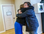 A patient going through detox, left, hugs Christine Massingale, clinical supervisor of the detox center at Recovery Works Northwest, a facility near Portland. Recovery Works is a medication-assisted treatment program, focusing on opioid dependency, that opened a new detox facility last fall, funded in part by Measure 110.
