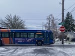 A Trimet bus travels through the intersection of Northeast 74th Street and Fremont Avenue in Portland's Roseway neighborhood on Friday, Jan. 19. 2024.