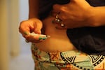 Palan injects herself every day for about six weeks to prepare for transferring eggs.