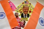 A kitemaker displays a kite decorated with an image of former US president and Republican presidential candidate Donald Trump in Amritsar on November 6.