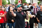 Joe Biggs, a member of the Proud Boys and former staffer at the conspiracy site Infowars, speaks to white supremacist demonstrators in Portland, Ore., Saturday, Aug. 17, 2019. Biggs organized the rally to "end antifa," referencing antifascist protesters who often show up to counter white supremacist groups in Portland.