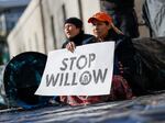 Climate activists hold a demonstration to urge President Biden to reject the Willow project on Nov. 17, 2022.