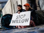 Climate activists hold a demonstration to urge President Biden to reject the Willow project on Nov. 17, 2022.