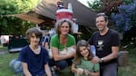 The Stephens with what remains of their emergency supplies after a weekend of living off their disaster kit. They pitched tents and ate from their stock of nonperishable foods.