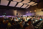 Hundreds attend the community meeting. 