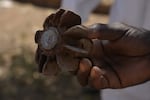 Pieces of projectile explosives are found in Omdurman, Jan. 11, 2025.