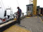 Dave Lacey prepares to launch his boat from the dock in Port Orford, Ore.