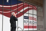 A smoker takes a break outside the 2016 Republican National Convention in Cleveland.