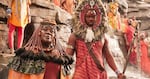 Representatives of Wakanda's mining tribe. The Maasai-inspired headdress on the warrior at the center was a last-minute creation originating from a beaded placemat, said designer Ruth E. Carter.