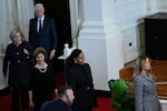 (L-R) Former US Secretary of State Hillary Clinton, former US First Lady Laura Bush, former US First Lady Michelle Obama, and former US First Lady Melania Trump arrive for a tribute service for former US First Lady Rosalynn Carter, at Glenn Memorial Church in Atlanta, Georgia, on November 28, 2023.