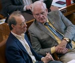 FILE - State Sen. Michael Dembrow, D-Portland, left, confers with Sen. Bill Hansell, R-Athena, at the Oregon Capitol in Salem, March 20, 2023. 