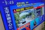 A tsunami warning is displayed on a television in Yokohama, near Tokyo, Wednesday, July 30, 2025, after Japan issued alerts following a strong earthquakes off the Kamchatka Peninsula.