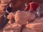 An image provided by the National Park Service shows two men who were caught on video in April toppling rock formations at Lake Mead National Recreation Area. A federal jury has indicted Wyatt Clifford Fain, 37, and Payden David Guy Cosper, 31, of Henderson, Nev.