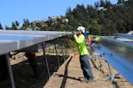 Solar panel installation company Imagine Energy frequently partners up with nonprofit Leaders Become Legends to provide job training for at-risk individuals to help them enter the renewable energy workforce. Here crews are installing solar panels at the 82nd Avenue Community Solar Project on 09/17/26.