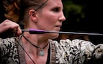 Katie Sterns of Arlington, Washington, has inspired a new generation to take up the ancient art of mounted archery. She pulls back her bow using her thumb and two fingers, a technique used by Mongolian mounted archers in ancient times.
