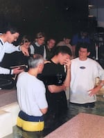 Ward at his baptism in 1997.