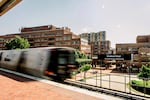 The Metro passes in front of 1320 Braddock Place in Alexandria, VA on July 29, 2026.