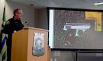 Portland Police Chief Bob Day addresses reporters on Sept. 29, 2026, during a press conference about a police involved shooting. Pictured is a handgun that allegedly belonged to the man killed by police.
