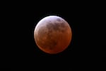 A full lunar eclipse is seen during the Blood Moon Lunar Eclipse in Palm Springs, Calif., on Thursday.
