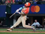 The American League's Jarren Duran of the Boston Red Sox hits a home run during the fifth inning of the MLB All-Star baseball game, Tuesday in Arlington, Texas.