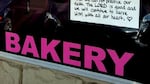 Aaron and Melissa Klein taped this sign in the window of their Gresham bakery in September 2013 when they closed the store and moved their bakery business into their home.