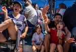 From left, French fan Aurélie Fornier cheers as her kids and husband Milo Cal, 6, Bayoán Cal and Ío Cal, 11, all rooting for Spain, react during the France versus Spain World Cup semifinal match at GOL in southeast Portland, Ore., on July 14, 2026.  “It’s a mess. It’s a mess," joked Bayoán Cal about his family's mixed fandom. “I’m trying to have the little one to change his mind, you know, between France and Spain," added Fornier. “No, no!” replied the youngest Cal. While Cal and his kids rooted against Fornier for Spain to beat France, they're ultimately hoping Argentina wins it all.