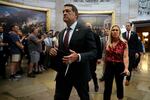 House Homeland Security Committee Chairman Mark Green, R-Tenn., Rep. Marjorie Taylor Greene, R-Ga., and their fellow Republican impeachment managers walk back through the U.S. Capitol Rotunda after transmitting articles of impeachment against Homeland Security Secretary Alejandro Mayorkas to the Senate on Tuesday.