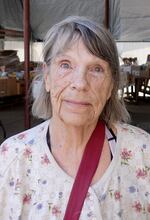 Debbie DeMarco picks up a food box July 1, 2025 at the Grand Sheramina Food Bank in Sheridan, Ore.
