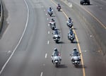 Motorcylces leading the procession of Sergeant Jeremy Brown drive up I-5 North in Clark Country, Washington, Tuesday, August 3.