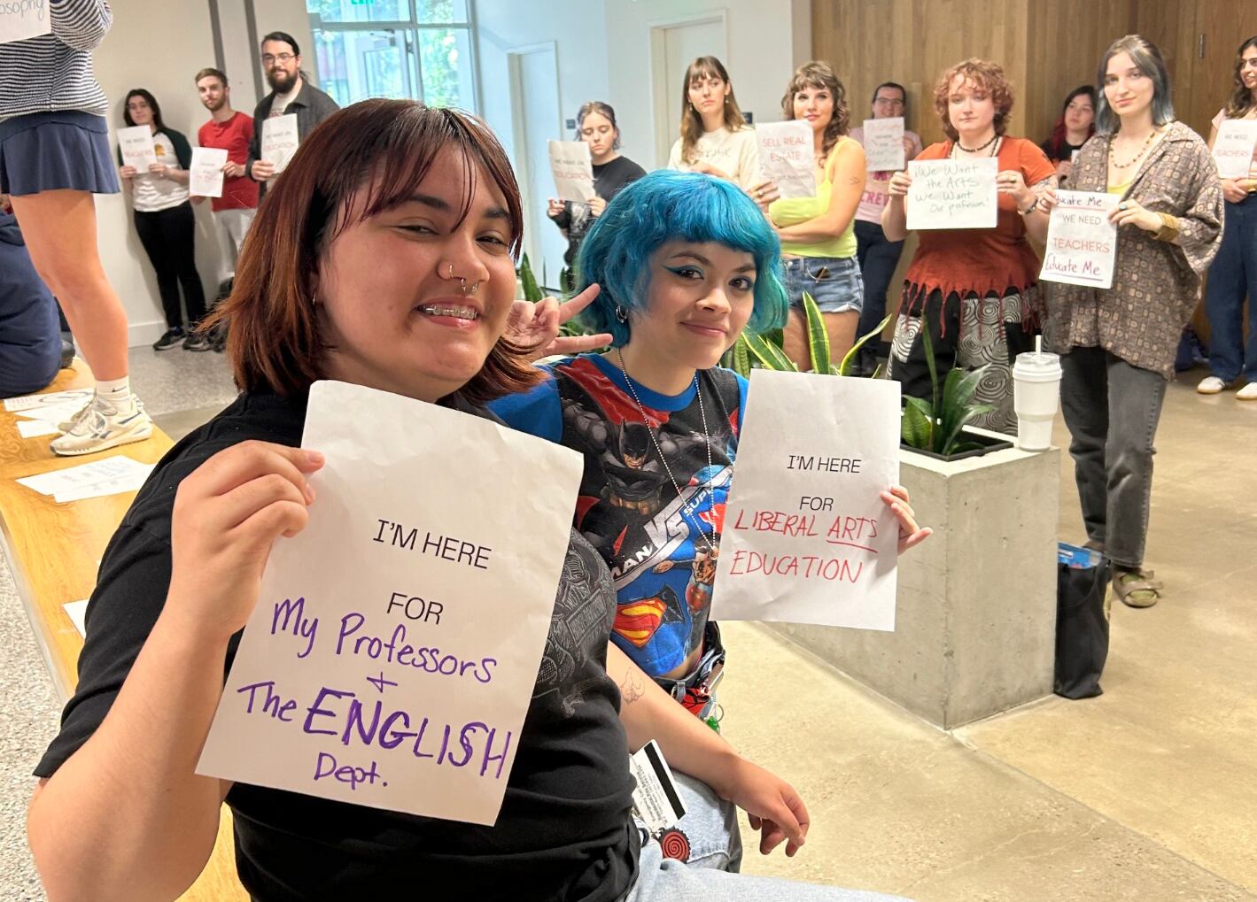 A supplied photo shows dozens of Linfield University students protesting proposed budget cuts in Graf Hall on May 5, 2025.