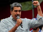 Venezuelan President Nicolas Maduro addresses government loyalists gathered at the presidential palace in support of his reelection one month after the presidential vote, in Caracas, Venezuela on Aug. 28, 2024.