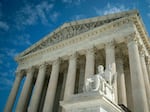 WASHINGTON, DC - SEPTEMBER 28: The Guardian or Authority of Law, created by sculptor James Earle Fraser, rests on the side of the U.S. Supreme Court on September 28, 2020 in Washington, DC. This week Seventh U.S. Circuit Court Judge Amy Coney Barrett, U.S. President Donald Trump's nominee to the Supreme Court, will begin meeting with Senators as she seeks to be confirmed before the presidential election. (Photo by Al Drago/Getty Images)