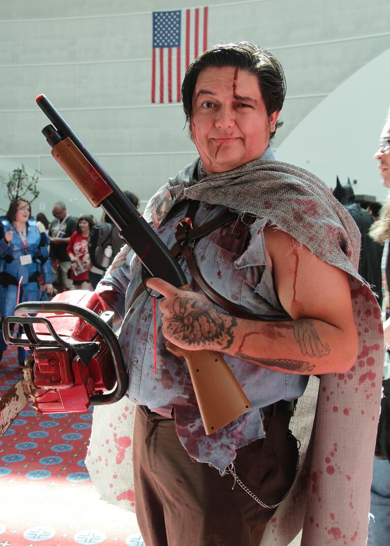 Eric Quale dressed as Ash from the Evil Dead movies. "This is my second year. We came back this year with a whole crew of kids, and my wife came too. Everybody's dressed up and having a good time," he says.