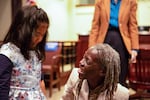 Commissioner Jo Ann Hardesty greets a young supporter on her first day in office at Portland City Hall.