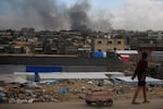 A Palestinian pulls a cart in Khan Younis, Gaza Strip, on Thursday.