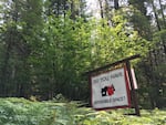 A roadside reminder in southwest Washington's Gifford Pinchot National Forest that homes in the "wildlands urban interface" need special landscaping, building materials and maintenance to reduce the risk of being destroyed by a wildfire.