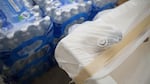 A covered drinking fountain sits next to cases of bottled water at Llewellyn Elementary in Sellwood, in Southeast Portland.