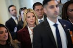 Former U.S. Attorney General Pam Bondi (center) arrives to testify at a closed-door interview with the House Oversight Committee on Capitol Hill on Friday in Washington, D.C. Lawmakers will ask Bondi questions about the federal government's handling of the Jeffrey Epstein case and release of related files to the public.