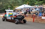 The Cornell Pump soapbox team careens down the track, being second in their race.