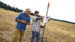 Mark Tveskov and Rory Becker, co-directors of the Maxville archaeological investigation, using the Bad Elf GPS Receiver to accurately pinpoint locations of archaeological remains in Maxville townsite, September 11, 2024.