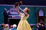 In this provided photo from 2021, Liya Zhao holds up a beaver doll in a new rendition of the classic ballet "The Nutcracker," set in 1840s Fort Vancouver.